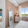 a bedroom with a large window