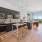 a kitchen with black cabinets