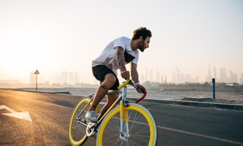 Find your perfect fit at Artem a man riding a bicycle on a road