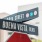 a street sign is posted at an intersection
