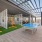 a pingpong table on a deck with seating areas
