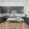a kitchen with black cabinets