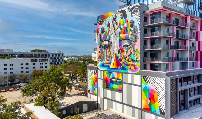 Settle into comfort at Artem a building with a mural on it