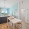 a kitchen with a table and chairs