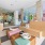 a clubhouse room with a table and chairs